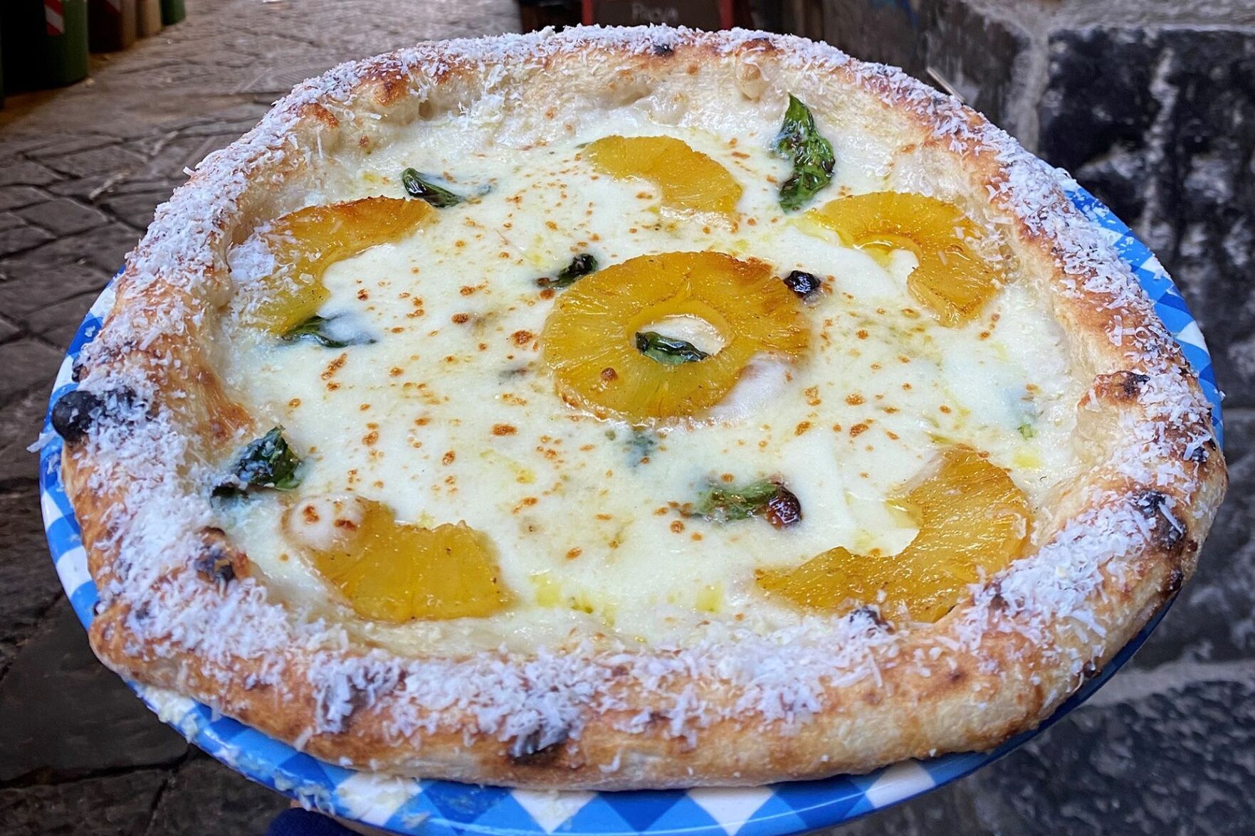Italy divided over new pineapple pizza